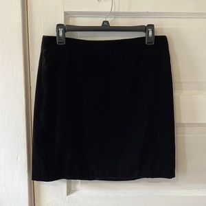 Black velvet mini skirt